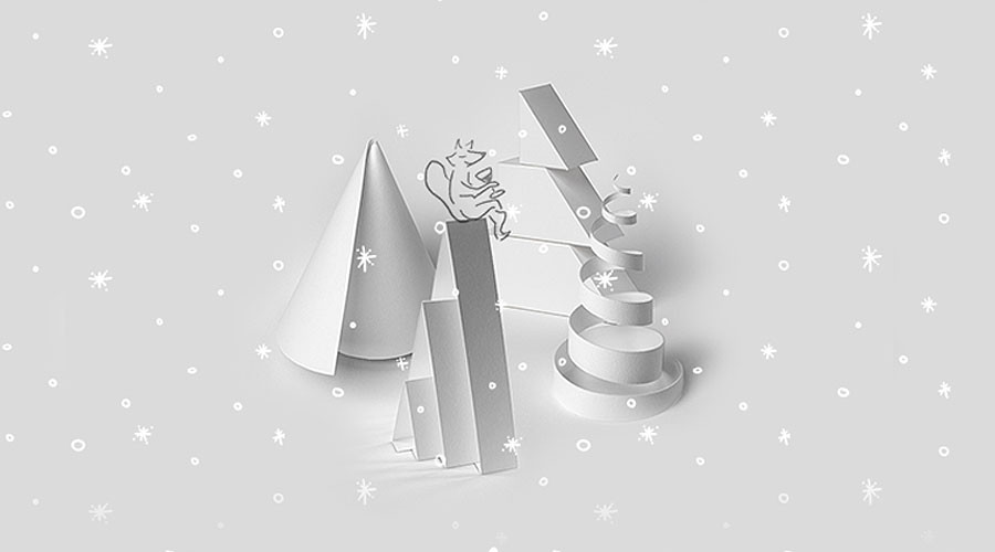 A gif of snowflakes falling over 3D paper Christmas trees for Wild’s augmented reality passion project